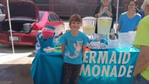 Young entrepreneurs operate lemonade stands while learning about business and finance with the help of national organization Lemonade Day. Image courtesy of Godfrey Aguwa Jr.
